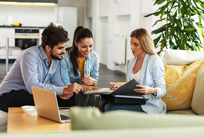 Couple meeting with life insurance agent