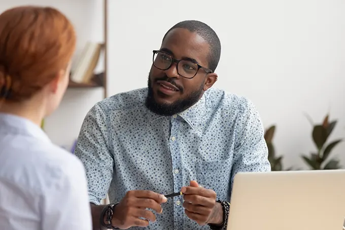 Customer service rep meeting with clients