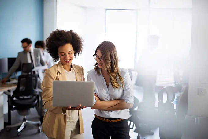 Insurance agent using computer at work to sell insurance