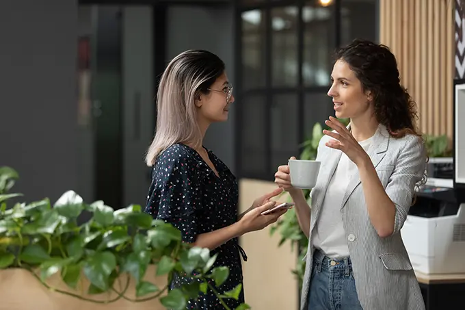 two-female-managers-discussing-plans-for-crm-implementation