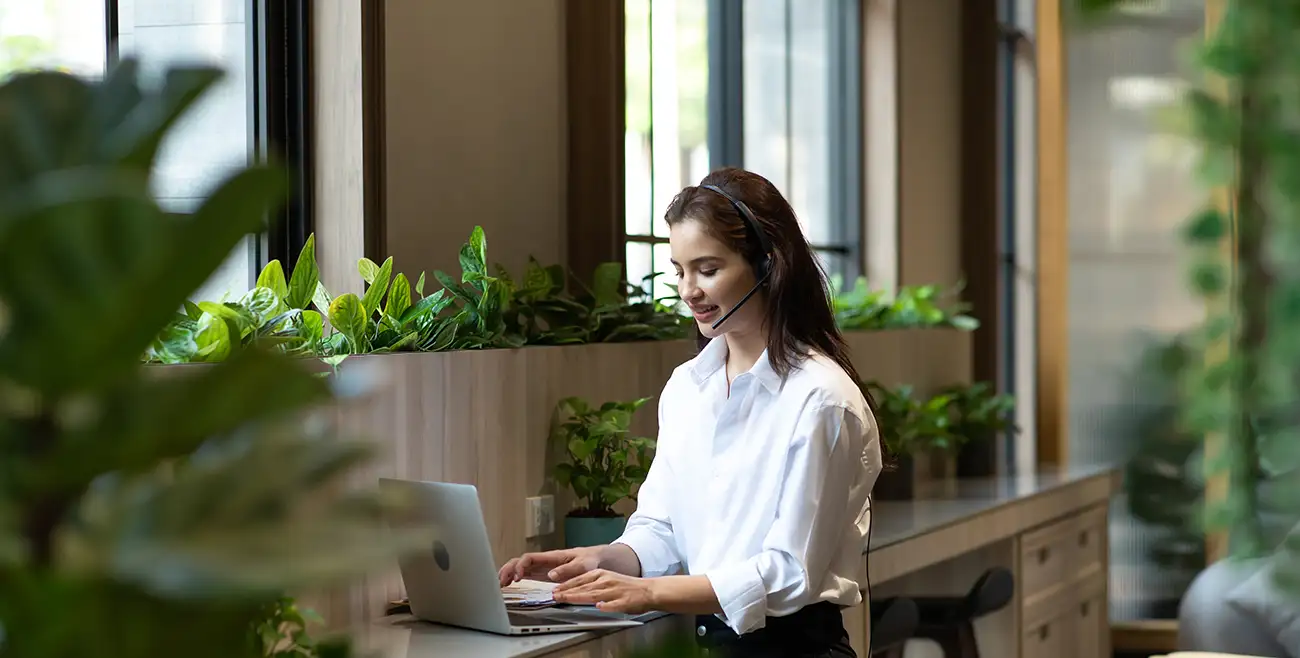 woman using voip caller from office