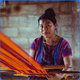 hispanic woman creating fabric