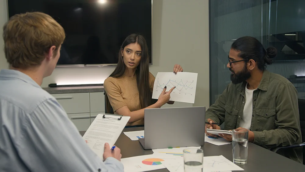 business-man-in-office-speaks-with-staff