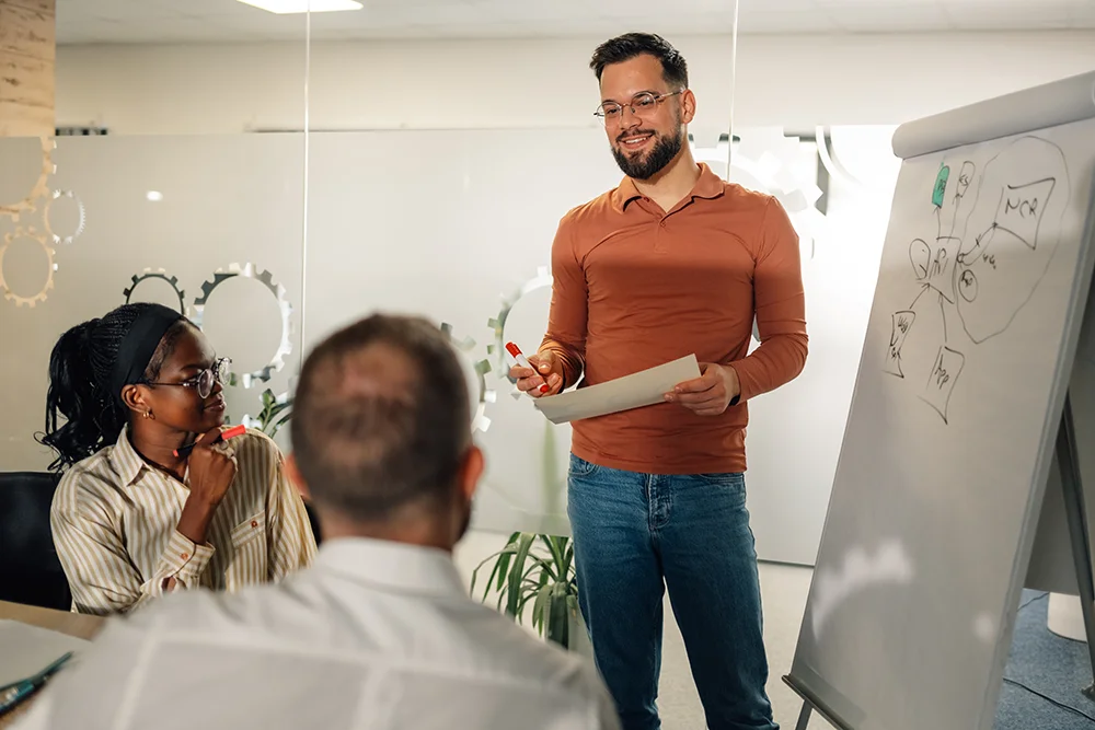 business-man-in-office-speaks-with-staff