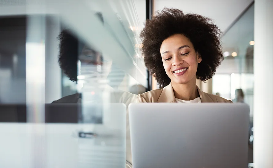 Team member managing sales scheduling on computer software