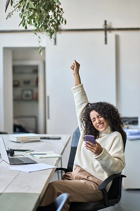 woman celebrating marketing email workflow